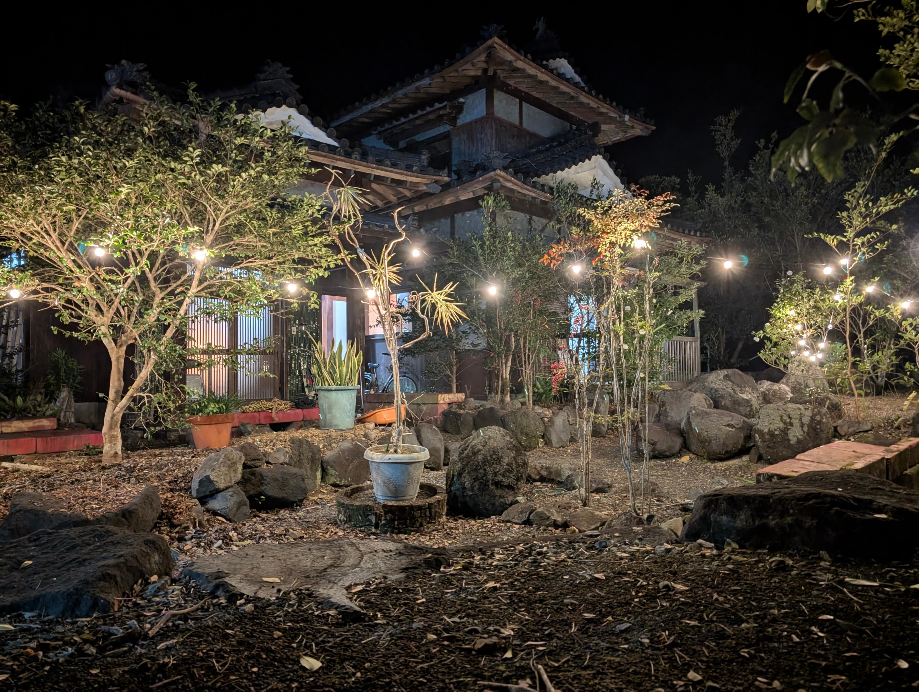 IKADA house at night with garden lights
